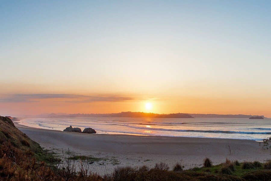 puresurfcamps-surfresort-loredo-strand-sonnenuntergang-spanien Surfresort Loredo